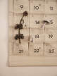 Nástěnný adventní kalendář Star Christmas Calendar, sand